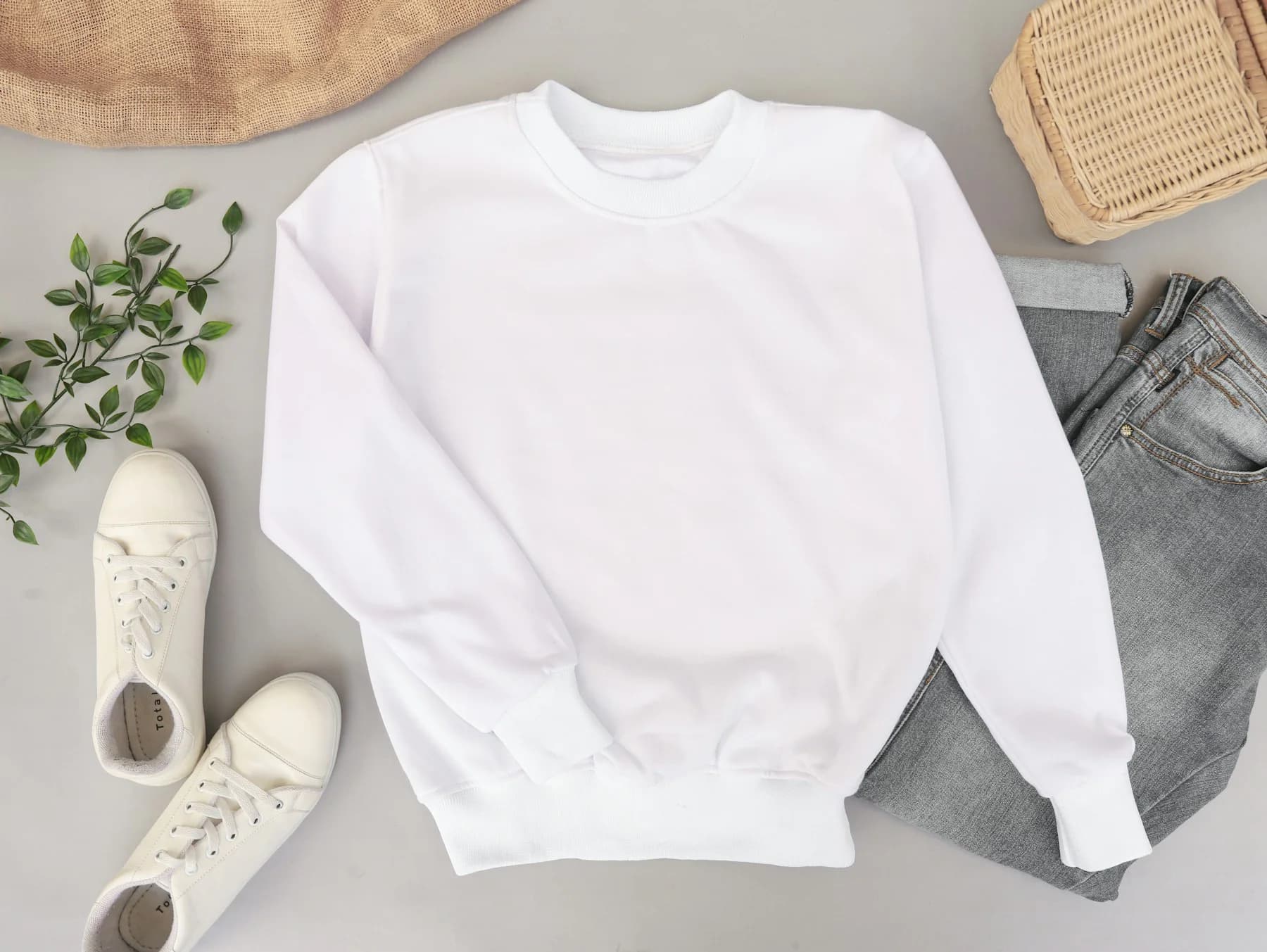 Ivory crewneck sweatshirt laid flat