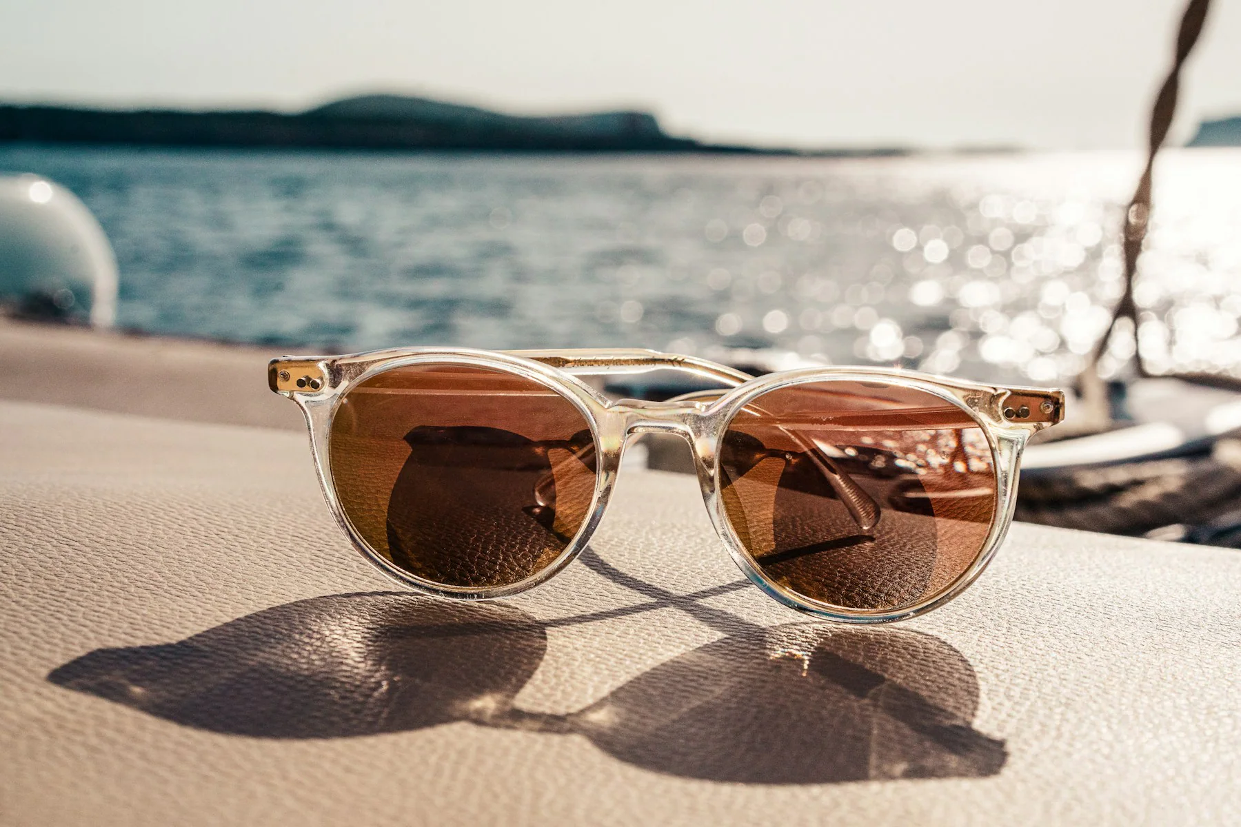 Tortoiseshell sunglasses on a sunny beach