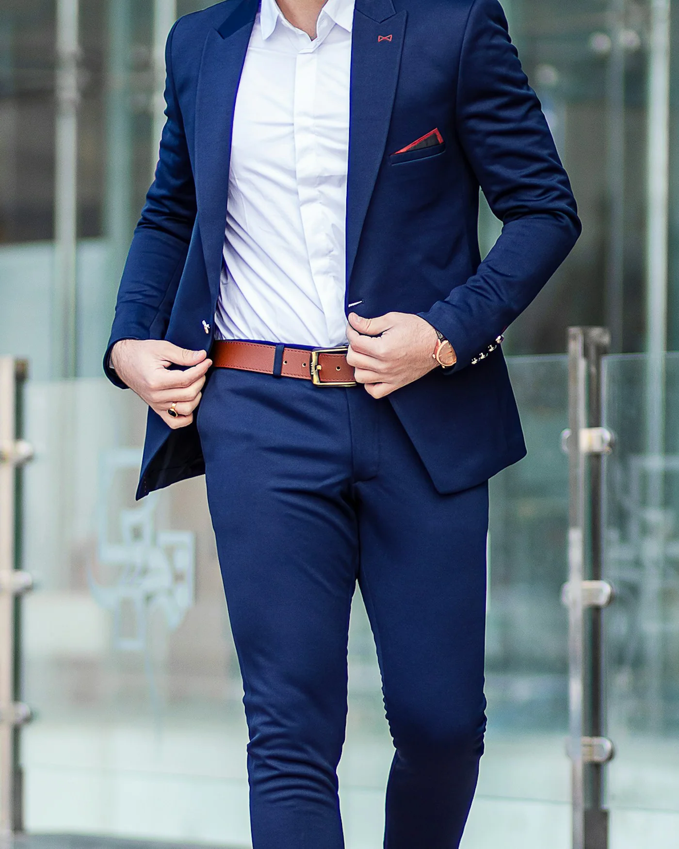 Man wearing a midnight-blue two-piece suit — detail
