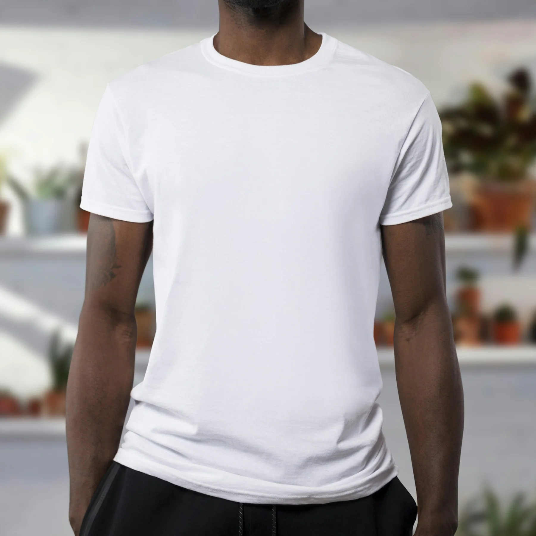 Man wearing a plain white heavyweight t-shirt